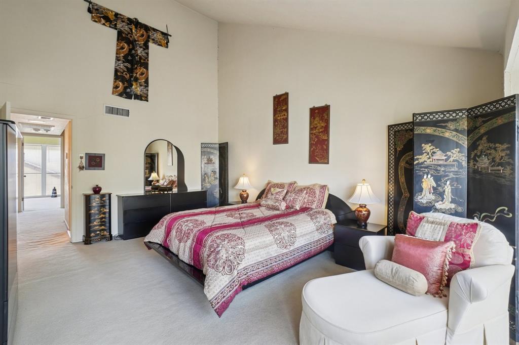 4569 North O'Connor Road, Unit 1319 Irving, TX 75062 - Photo 18 of 40 a bedroom with a bed and a couch