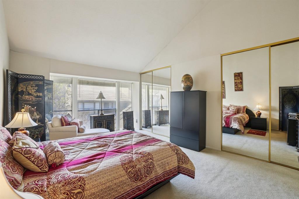 4569 North O'Connor Road, Unit 1319 Irving, TX 75062 - Photo 19 of 40 a bedroom with a bed and a large window