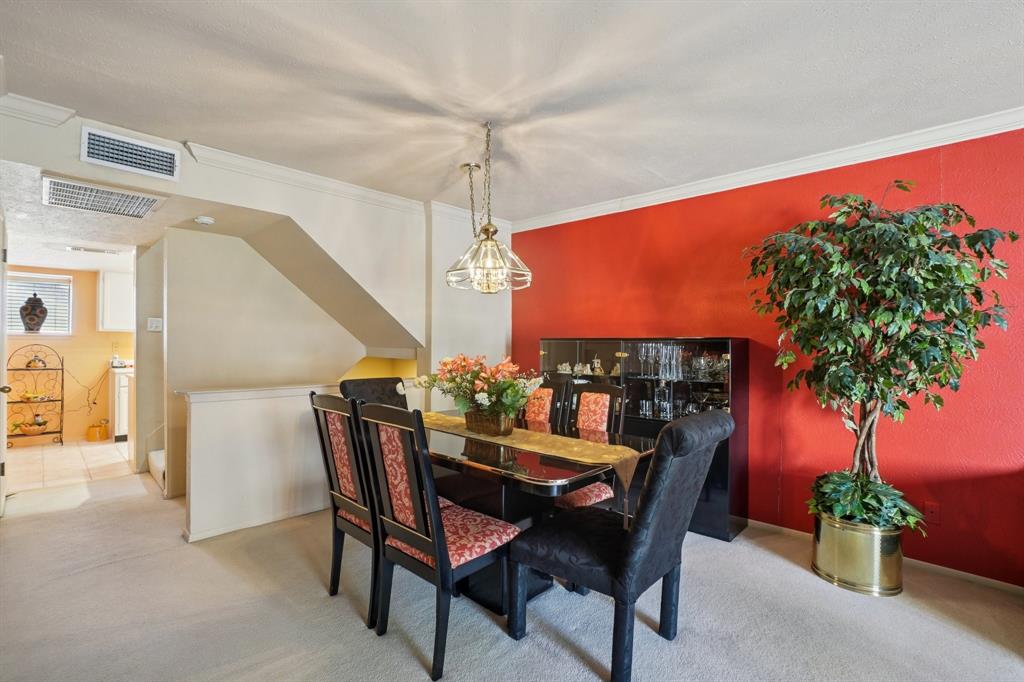 4569 North O'Connor Road, Unit 1319 Irving, TX 75062 - Photo 9 of 40 a view of a chairs and table in the patio