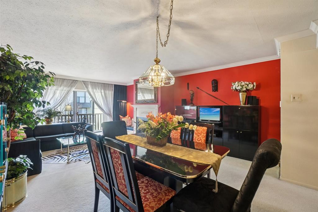 4569 North O'Connor Road, Unit 1319 Irving, TX 75062 - Photo 10 of 40 a view of a dining room with furniture window and wooden floor