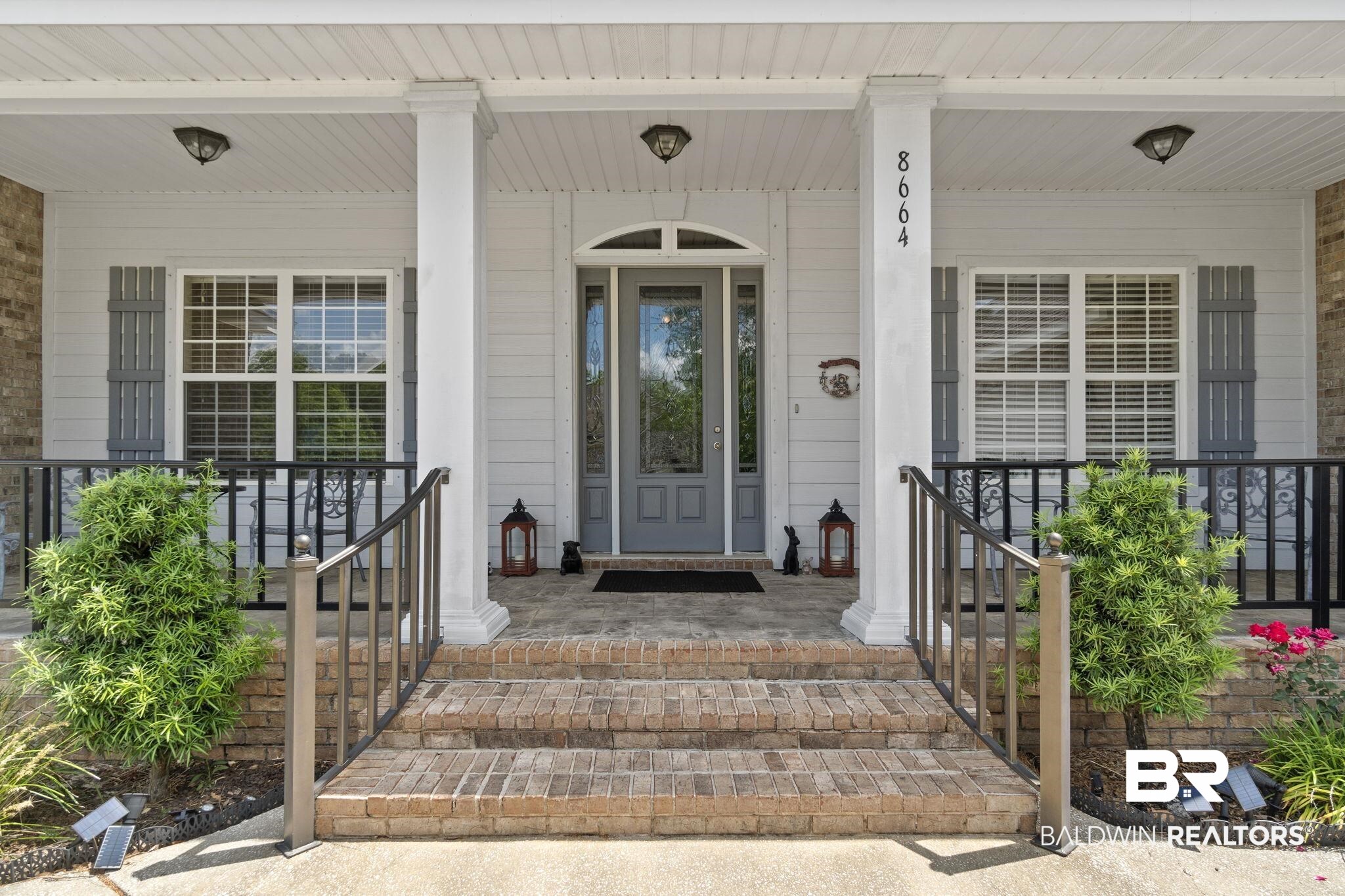 8664 Foxtail Loop Pensacola, FL 32526 - Photo 2 of 64 Entrance to property with covered porch