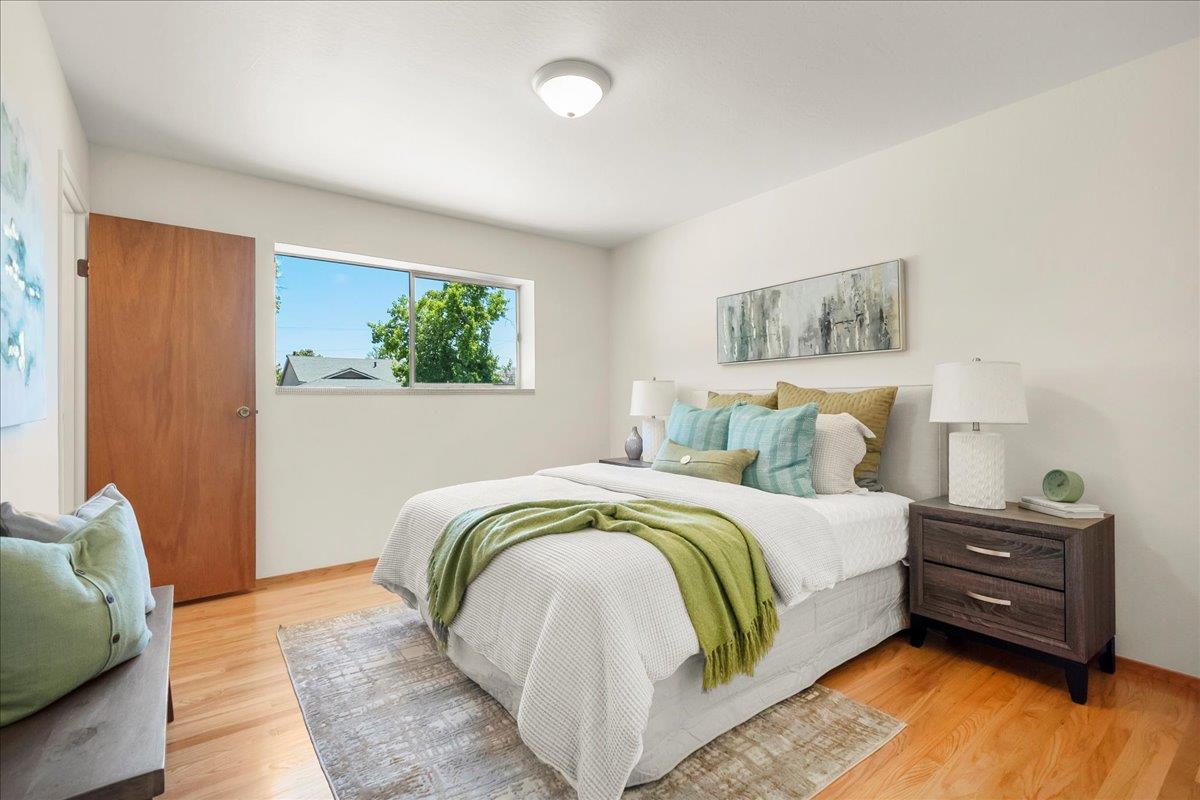 5371 Clovercrest Drive San Jose, CA 95118 - Photo 15 of 29 a bedroom with a bed and a painting on the wall