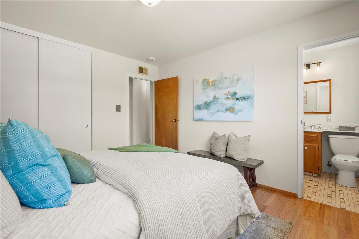 5371 Clovercrest Drive San Jose, CA 95118 - Photo 16 of 29 a bedroom with a bed and a view of bathroom