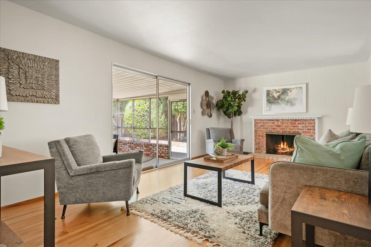 5371 Clovercrest Drive San Jose, CA 95118 - Photo 2 of 29 a living room with furniture and a fireplace