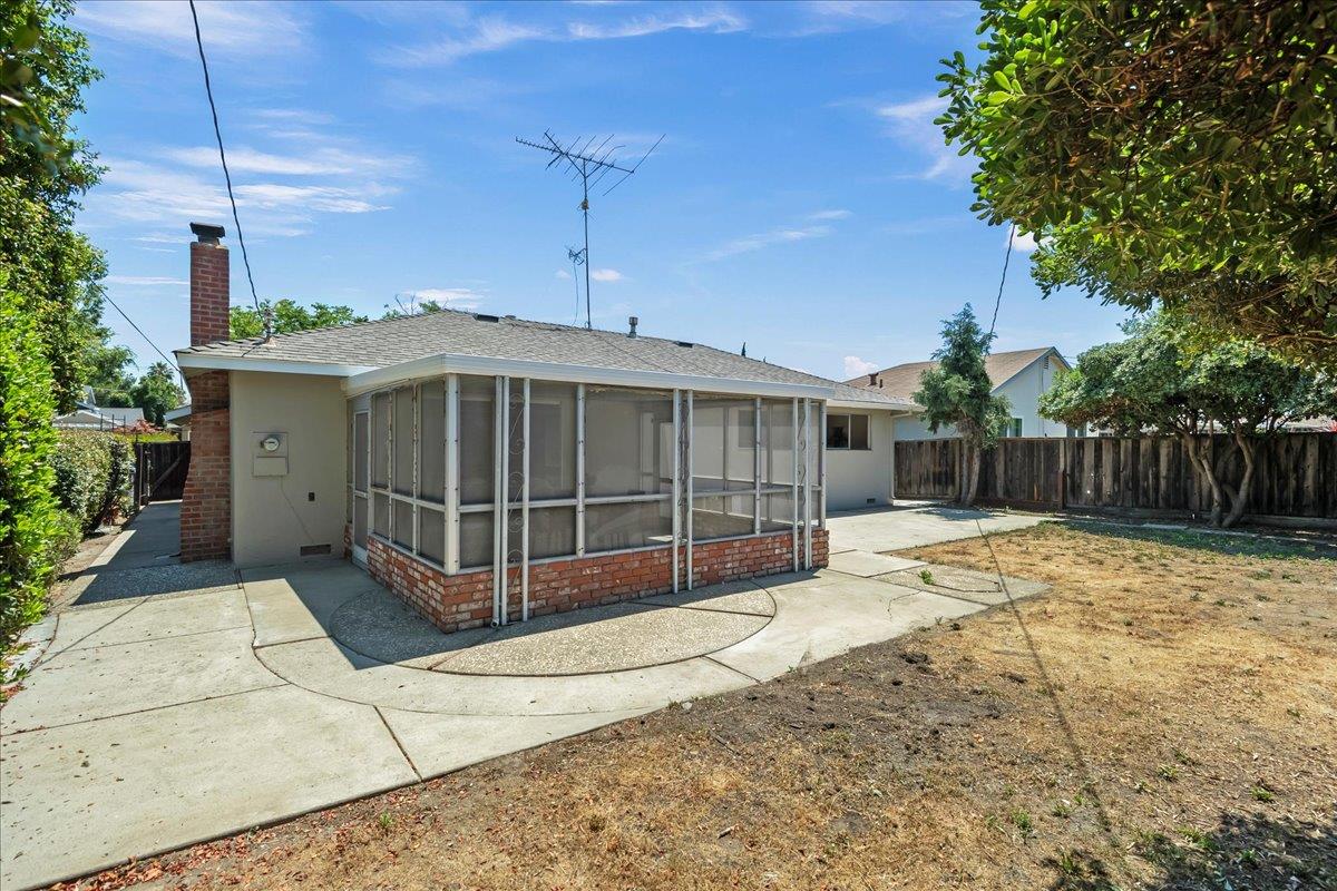 5371 Clovercrest Drive San Jose, CA 95118 - Photo 26 of 29 a view of a house with a yard and wooden fence