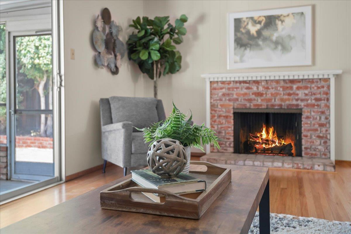 5371 Clovercrest Drive San Jose, CA 95118 - Photo 3 of 29 a living room with furniture and a fireplace