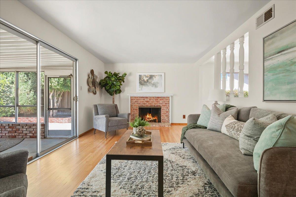 5371 Clovercrest Drive San Jose, CA 95118 - Photo 4 of 29 a living room with furniture and a fireplace