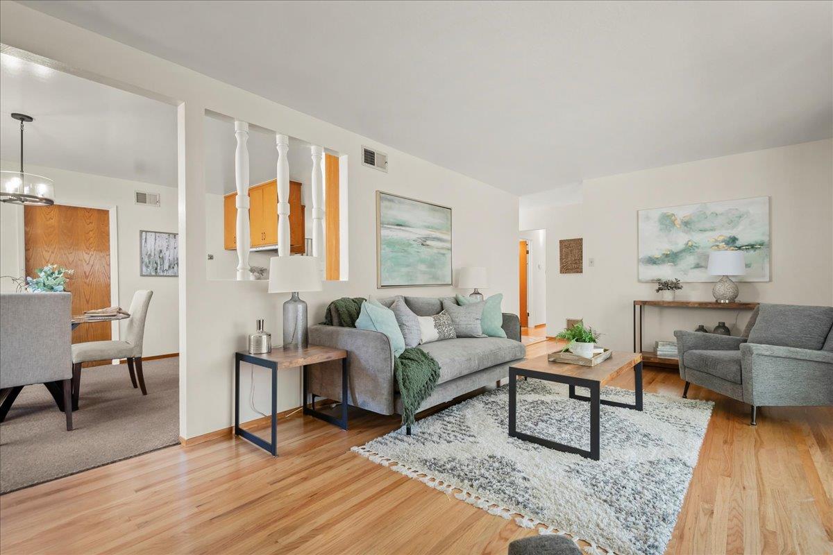 5371 Clovercrest Drive San Jose, CA 95118 - Photo 8 of 29 a living room with furniture and a wooden floor