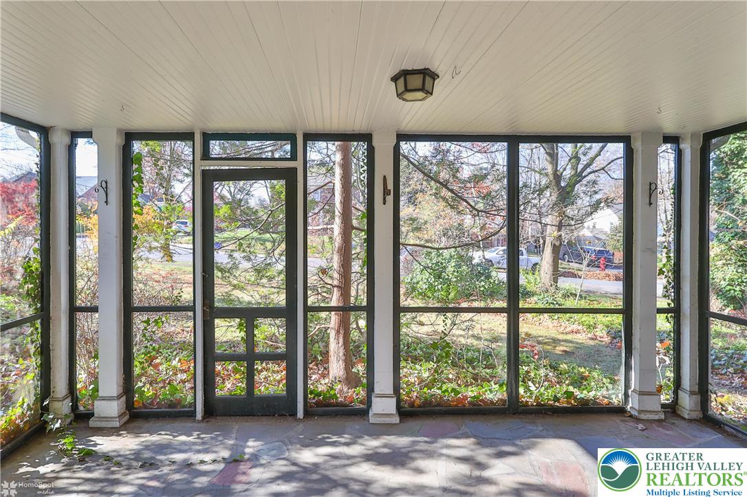 1104 Raymond Avenue Bethlehem, PA 18018 - Photo 12 of 67 a view of hall with floor to ceiling windows and yard