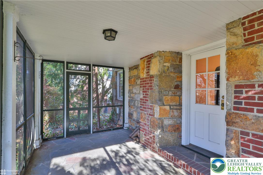 1104 Raymond Avenue Bethlehem, PA 18018 - Photo 15 of 67 a bedroom with a bed and wooden floor
