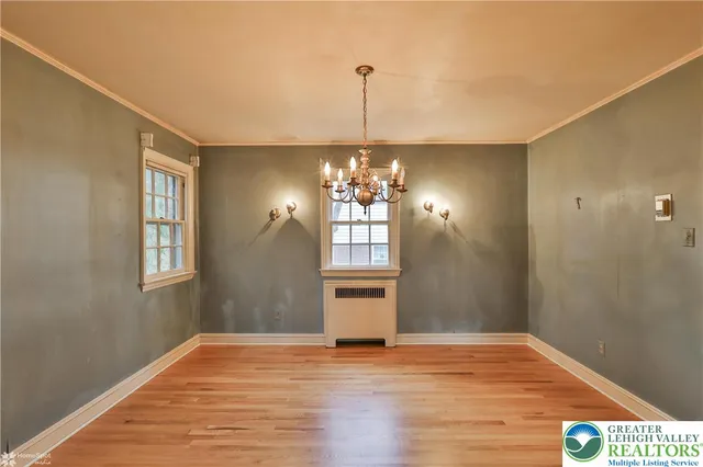 a kitchen with a refrigerator stove and sink