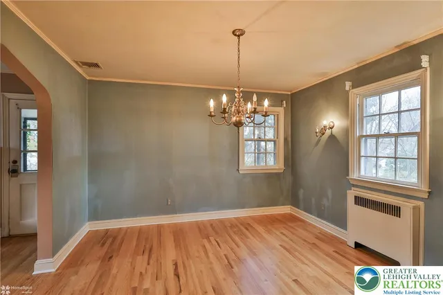 a kitchen with stainless steel appliances a sink and a window