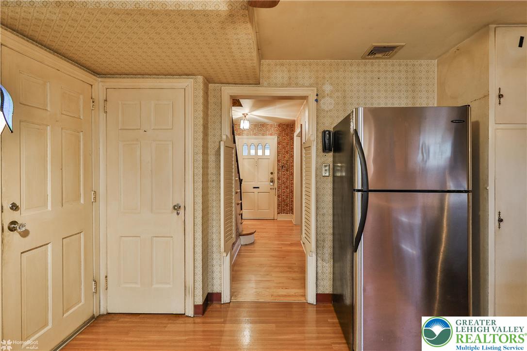 1104 Raymond Avenue Bethlehem, PA 18018 - Photo 26 of 67 a view of a refrigerator in kitchen and wooden floor