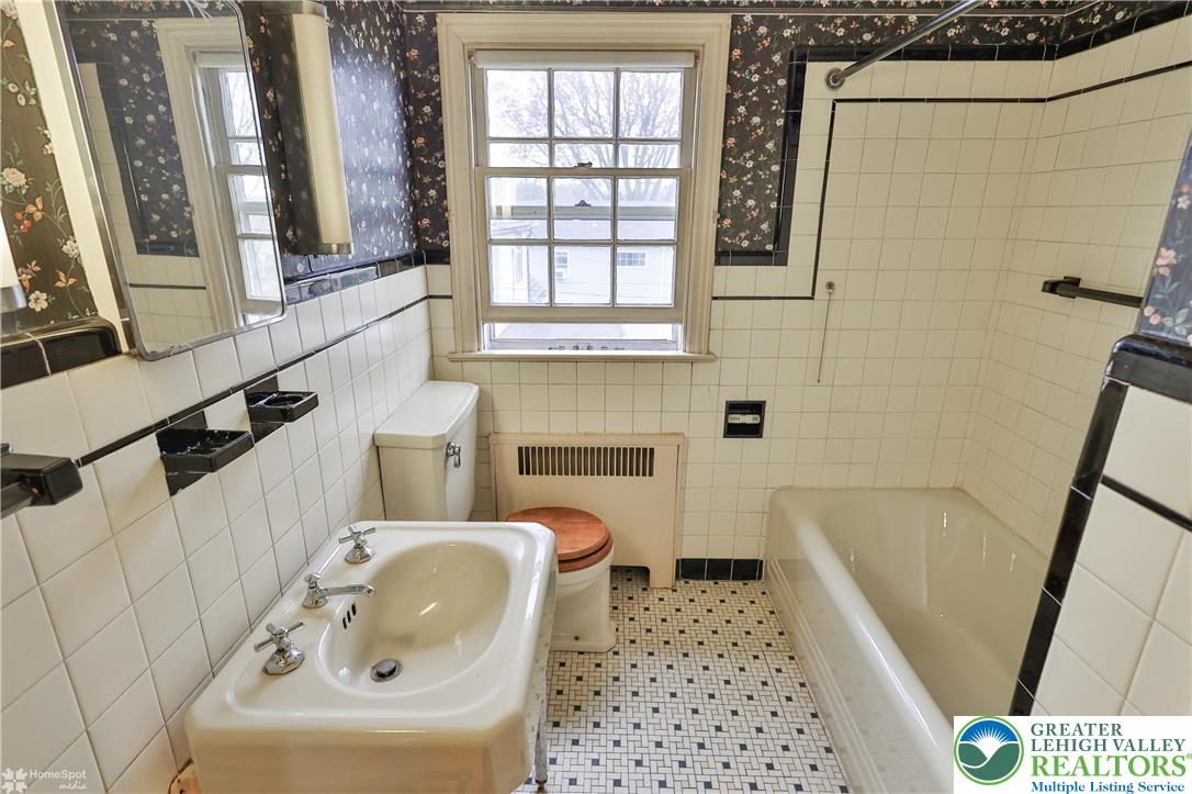 1104 Raymond Avenue Bethlehem, PA 18018 - Photo 43 of 67 a bathroom with a sink a toilet and a bathtub