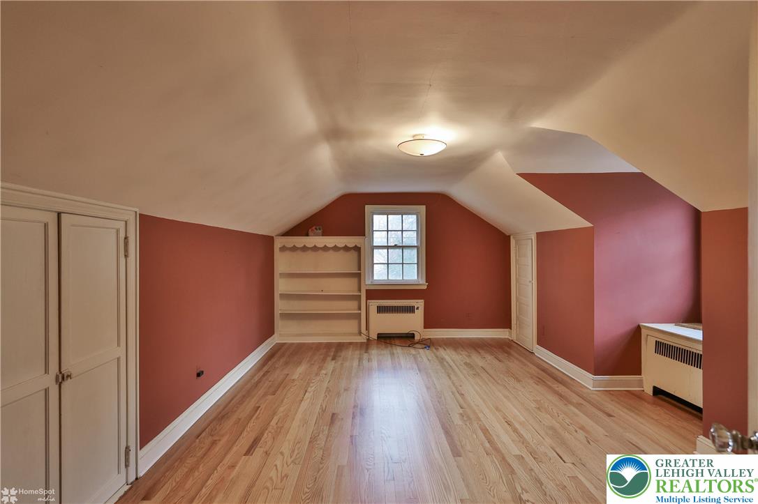 1104 Raymond Avenue Bethlehem, PA 18018 - Photo 45 of 67 a view of empty room with wooden floor and fan