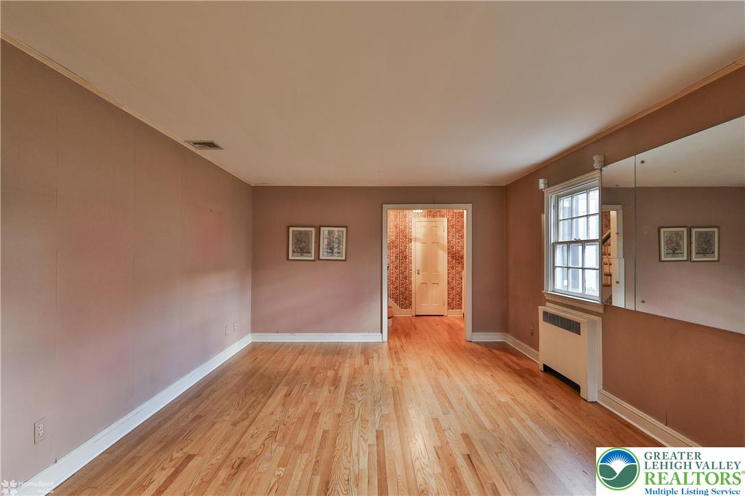 1104 Raymond Avenue Bethlehem, PA 18018 - Photo 10 of 67 a view of empty room with wooden floor and fan