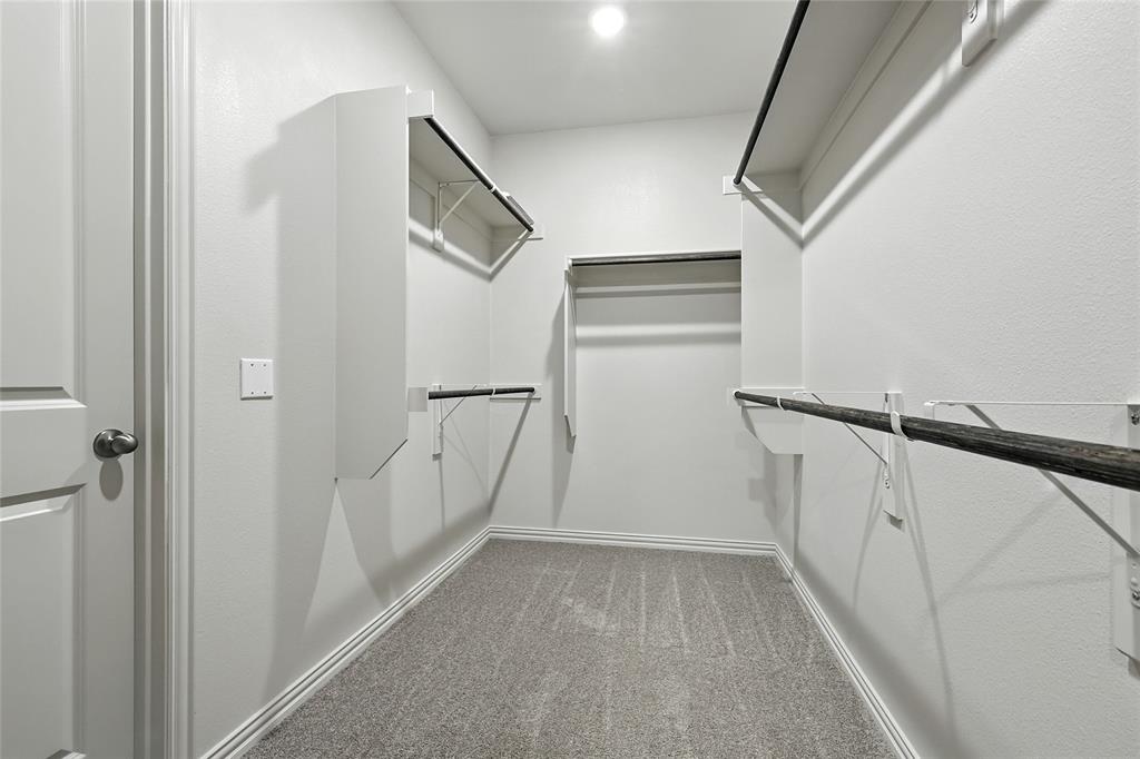 1434 Odette Drive Arlington, TX 76013 - Photo 24 of 38 Spacious closet featuring carpet