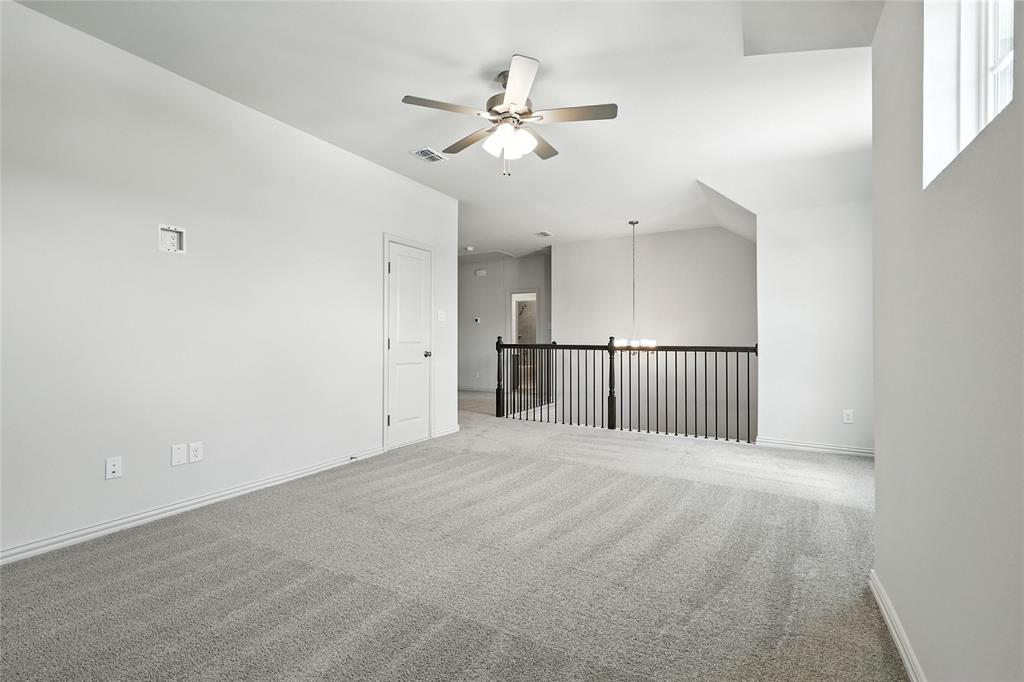 1434 Odette Drive Arlington, TX 76013 - Photo 30 of 38 Spare room featuring a ceiling fan and carpet floors