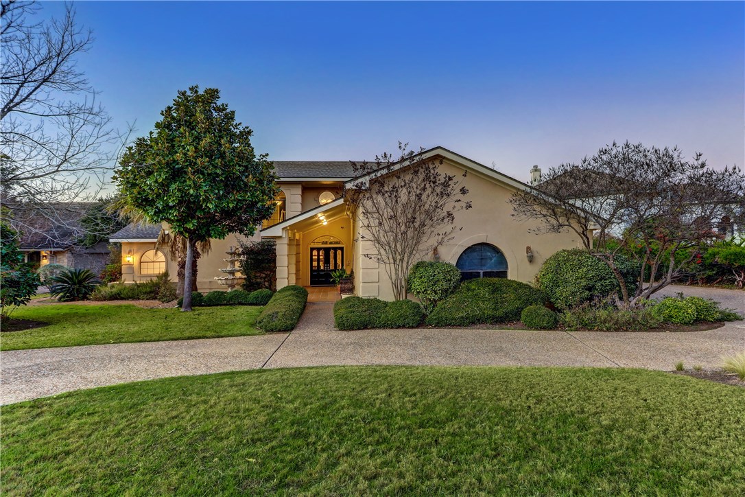 501 Explorer Lakeway, TX 78734 - Photo 1 of 1 a front view of house with yard and green space