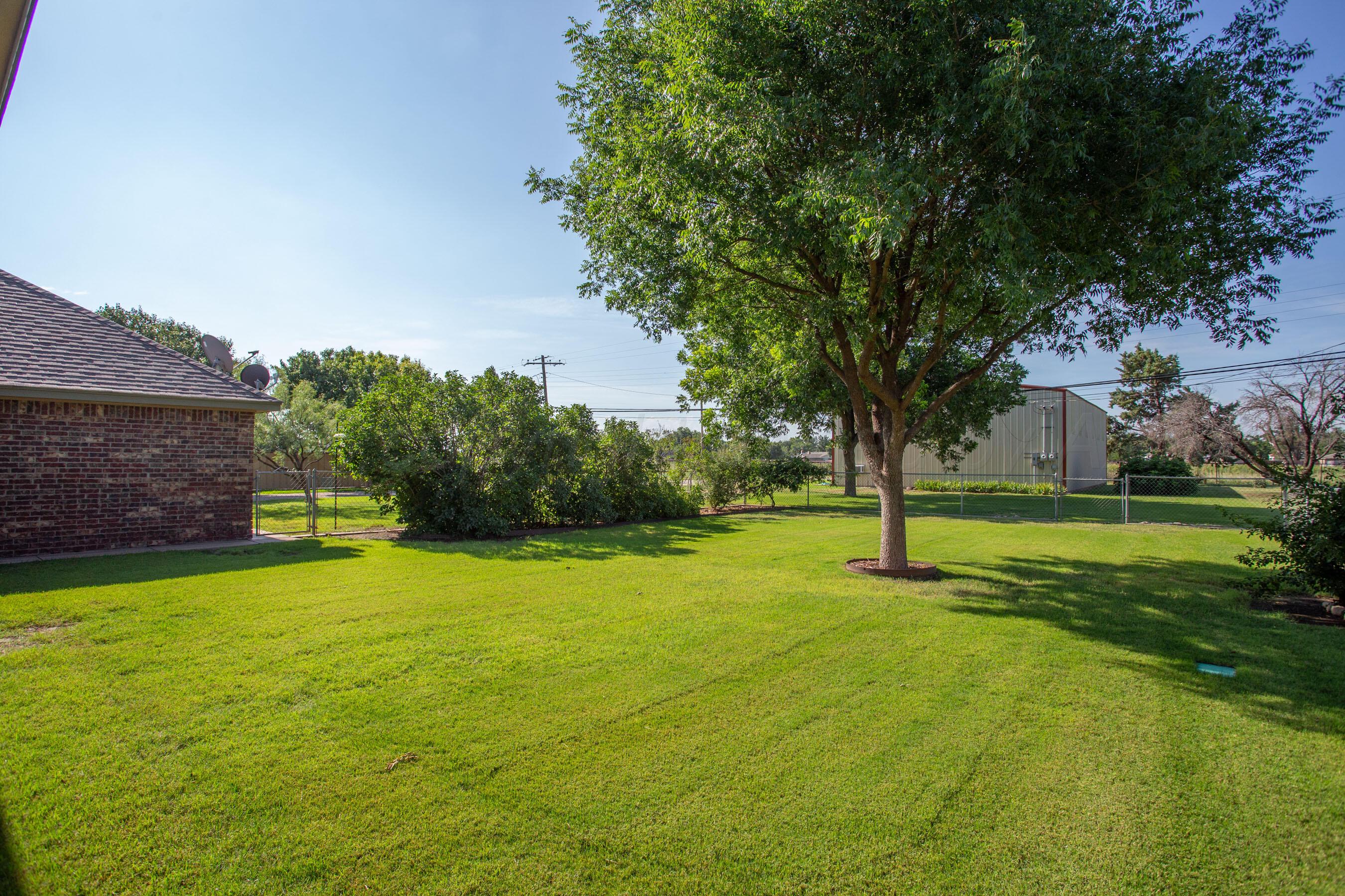 4823 Arden Road Amarillo, TX 79110 - Photo 39 of 53 a view of swimming pool with trees in the background