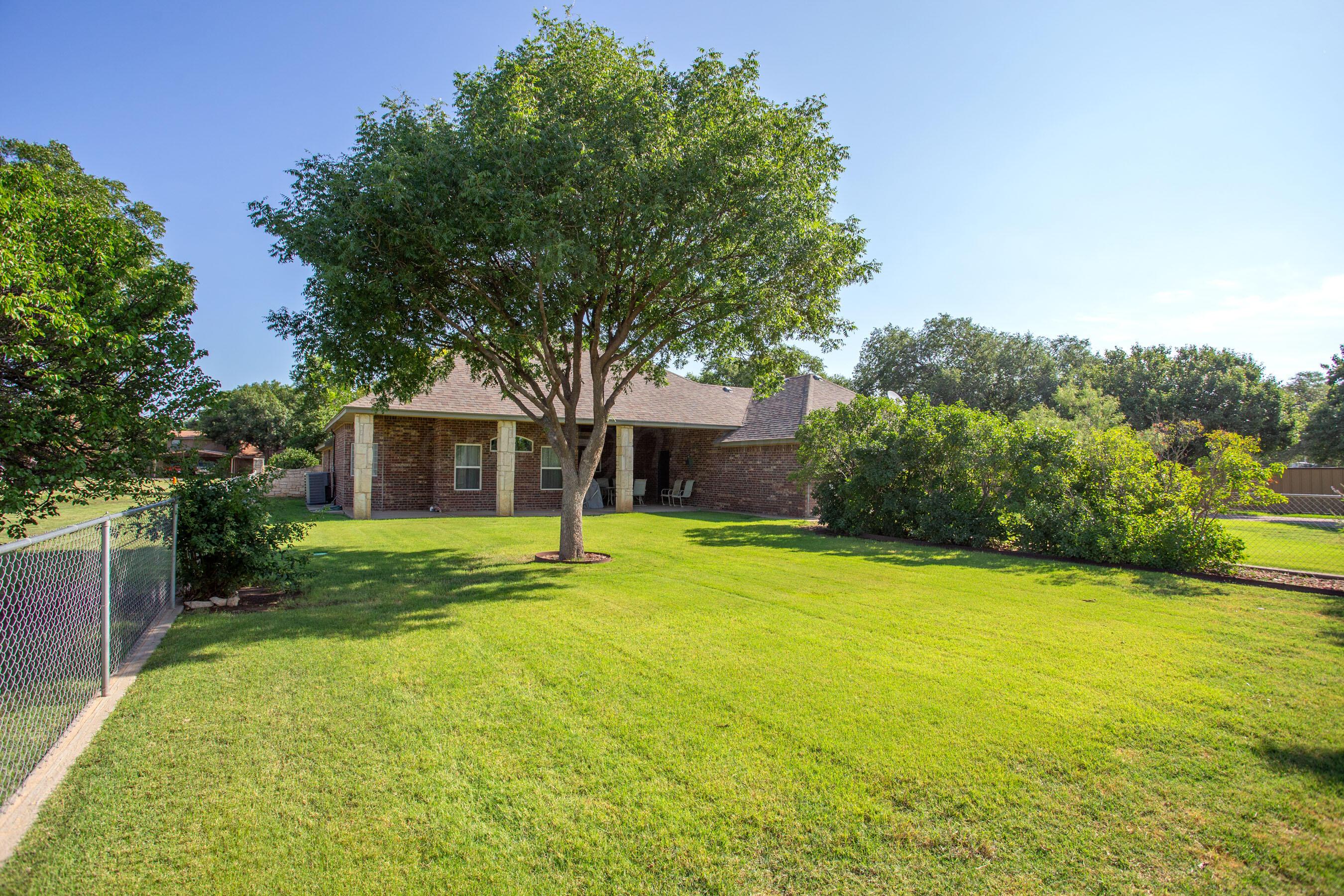 4823 Arden Road Amarillo, TX 79110 - Photo 40 of 53 a front view of a house with garden
