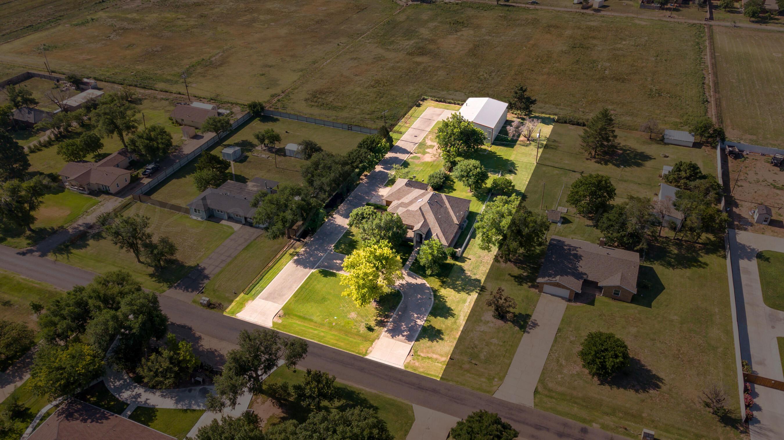 4823 Arden Road Amarillo, TX 79110 - Photo 50 of 53 an aerial view of a house with a yard