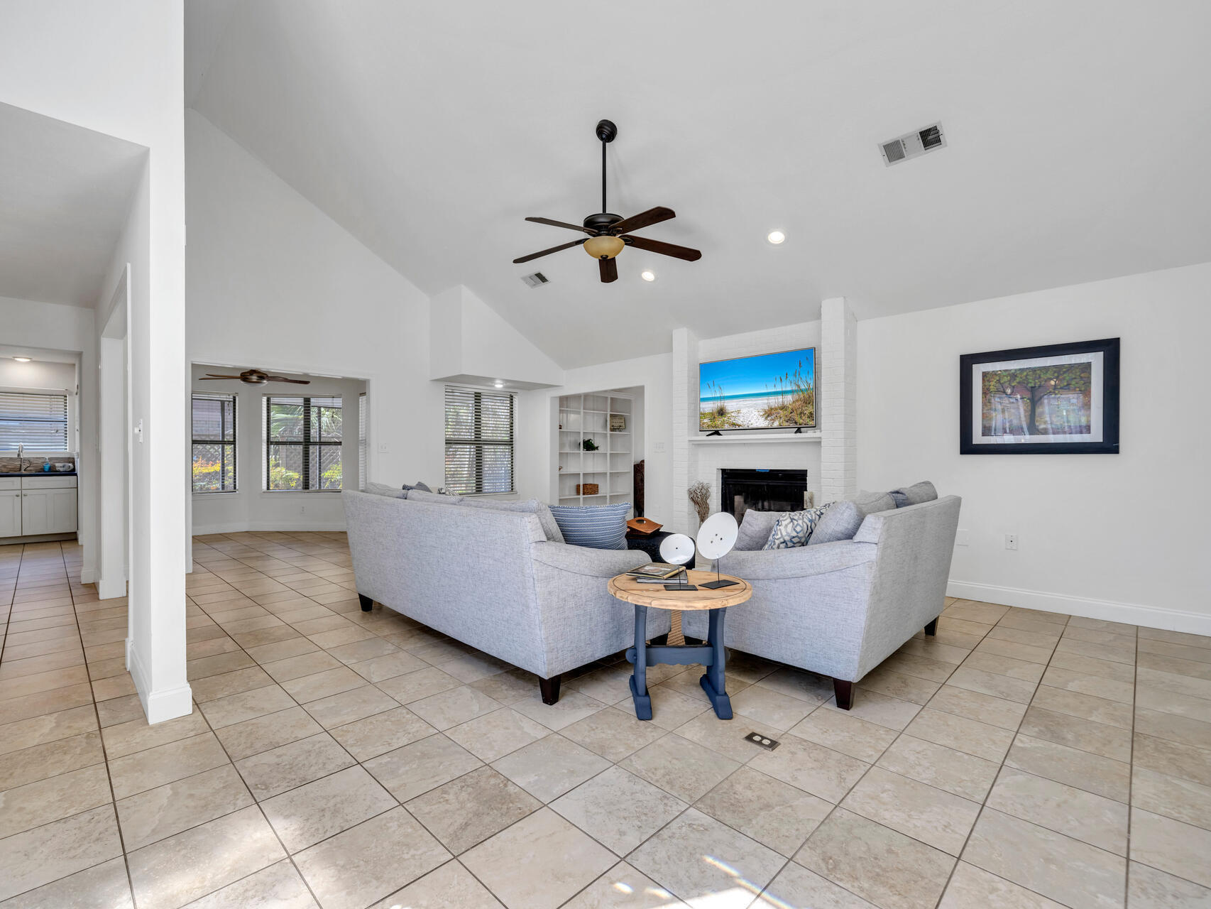 1182 Muirfield Way Niceville, FL 32578 - Photo 14 of 45 a living room with furniture and a fireplace