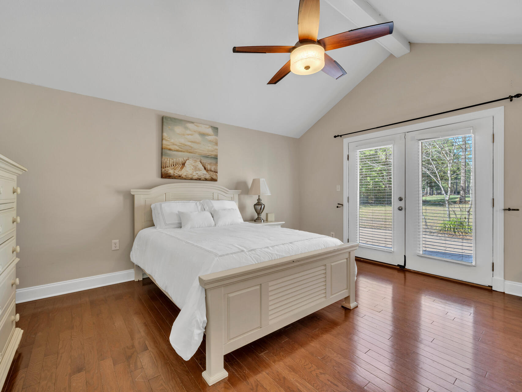 1182 Muirfield Way Niceville, FL 32578 - Photo 30 of 45 a bedroom with a large bed and a window