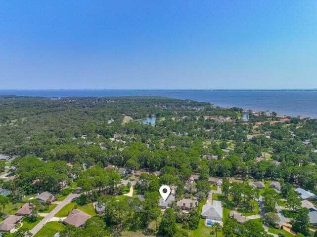 1182 Muirfield Way Niceville, FL 32578 - Photo 3 of 45 an aerial view of residential houses with outdoor space and trees