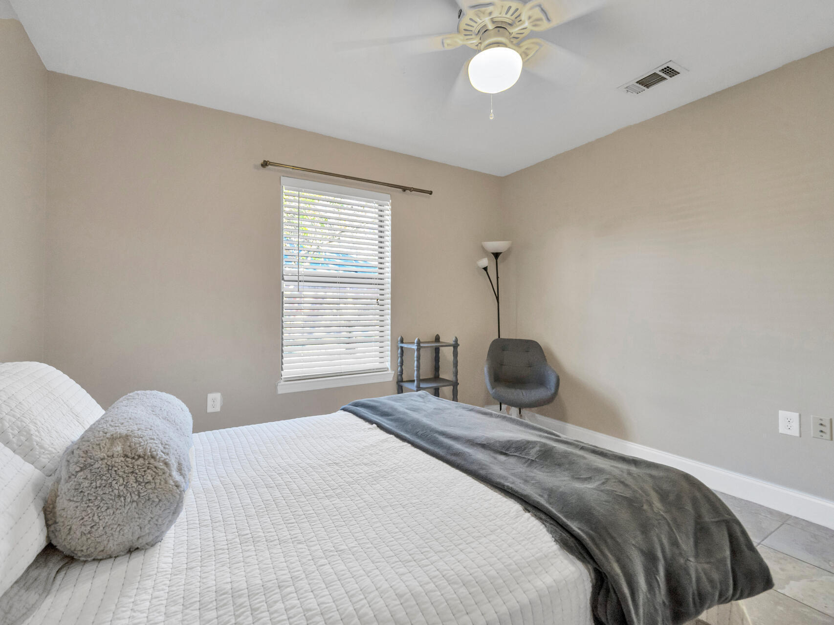 1182 Muirfield Way Niceville, FL 32578 - Photo 36 of 45 a bedroom with a bed and window