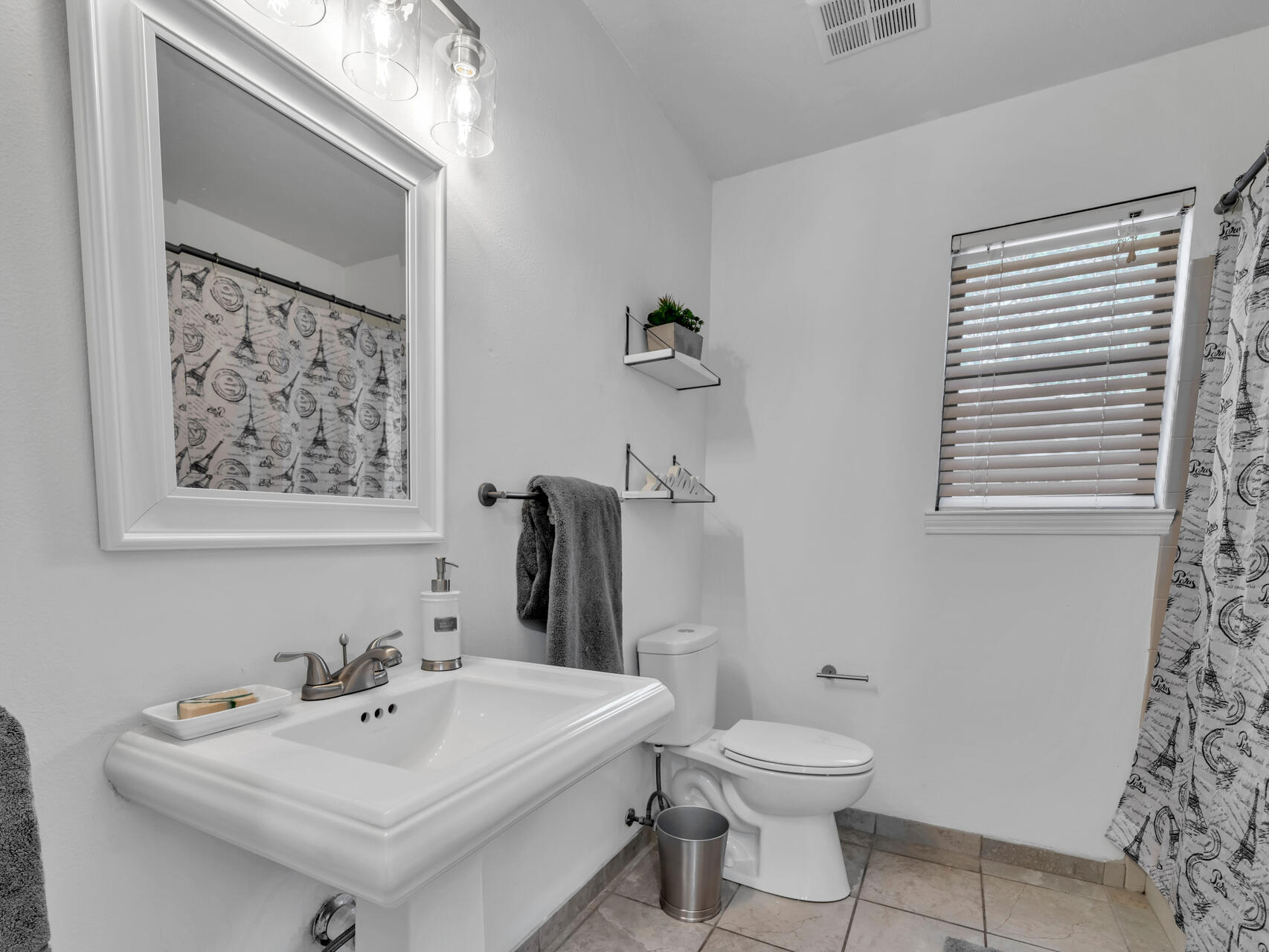 1182 Muirfield Way Niceville, FL 32578 - Photo 37 of 45 a bathroom with a sink a toilet and a mirror
