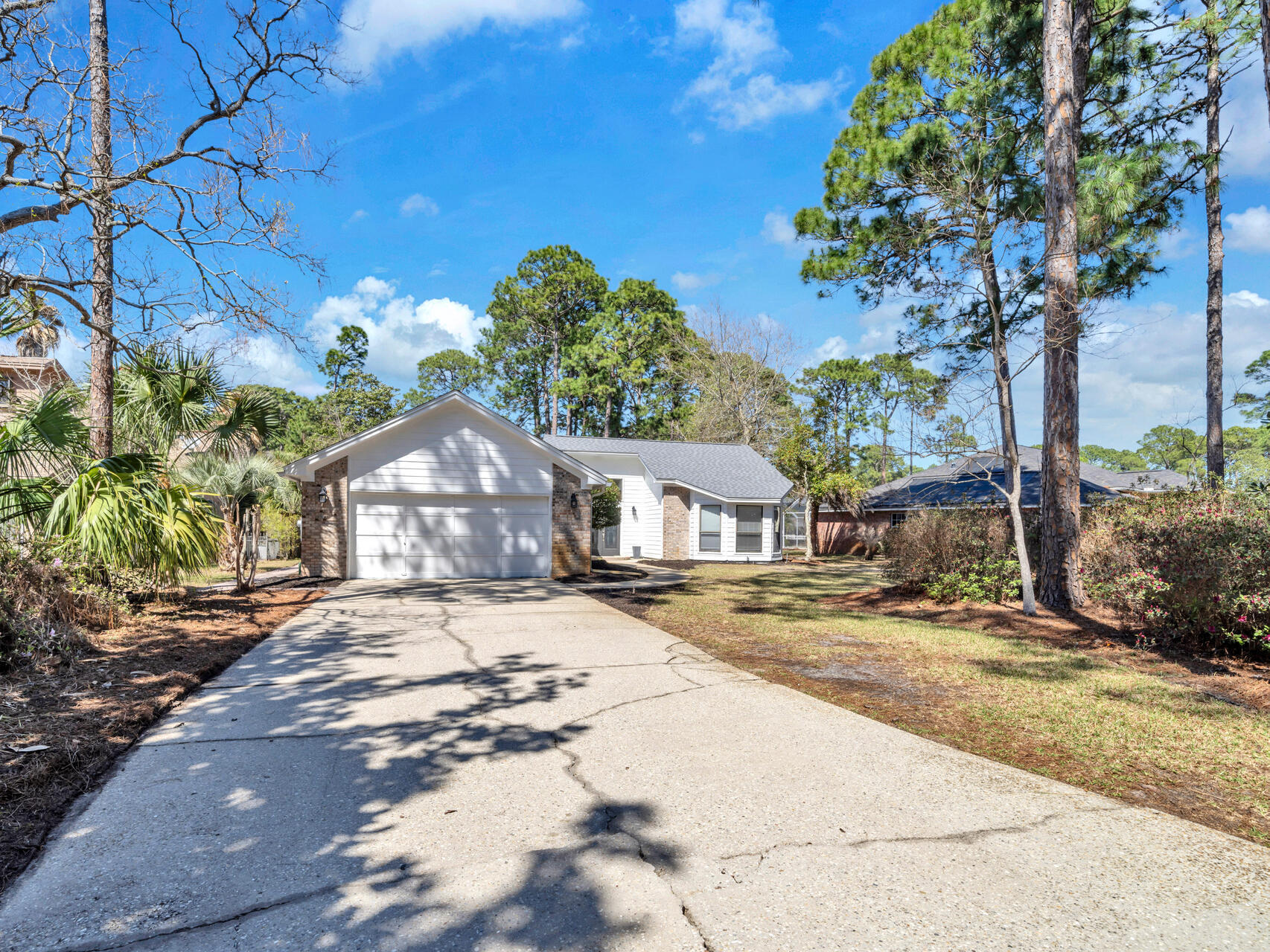 1182 Muirfield Way Niceville, FL 32578 - Photo 44 of 45 a view of a house with a tree in front