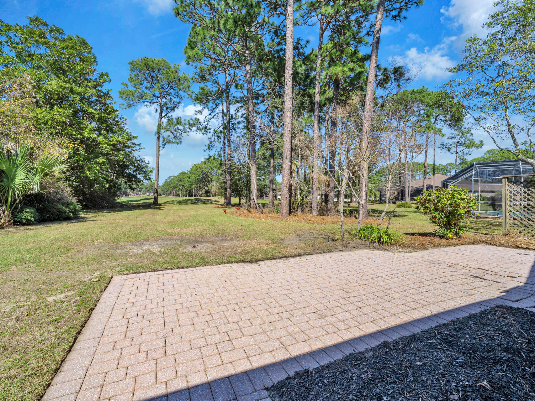1182 Muirfield Way Niceville, FL 32578 - Photo 7 of 45 a view of a backyard