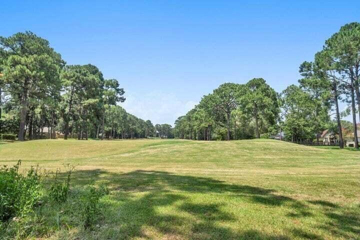 1182 Muirfield Way Niceville, FL 32578 - Photo 9 of 45 a view of an ocean beach and an outdoor space
