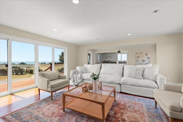 a view of a kitchen and dining room