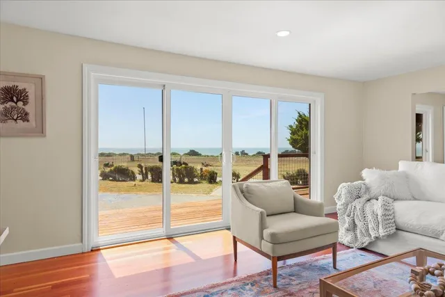 a kitchen with granite countertop a sink and cabinets