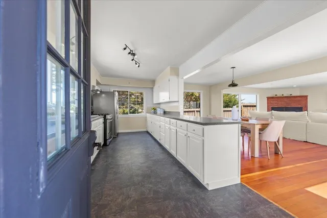 a bedroom with a bed and a mirror