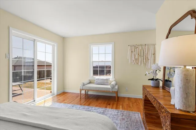 a bedroom with a bed and dresser