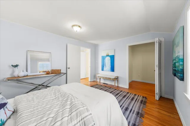 a swimming pool with lawn chairs