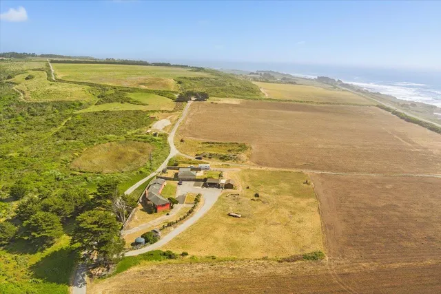 a view of a living room and dining room