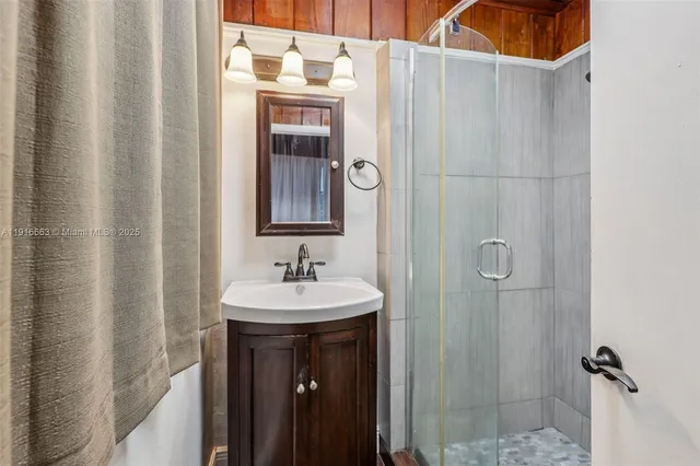 a bathroom with a toilet and a sink