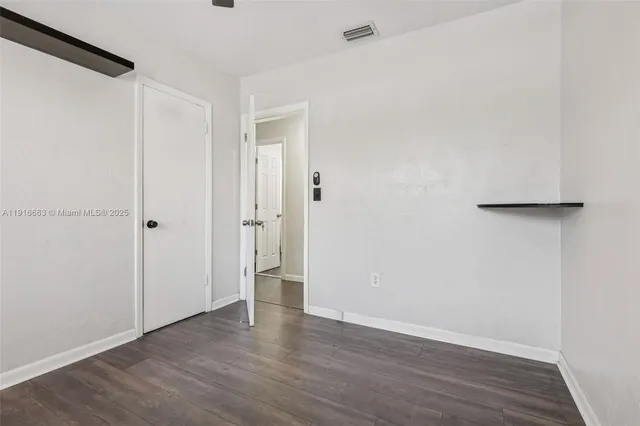 a bathroom with a sink a mirror and a shower