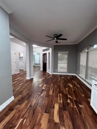 a view of an empty room and window
