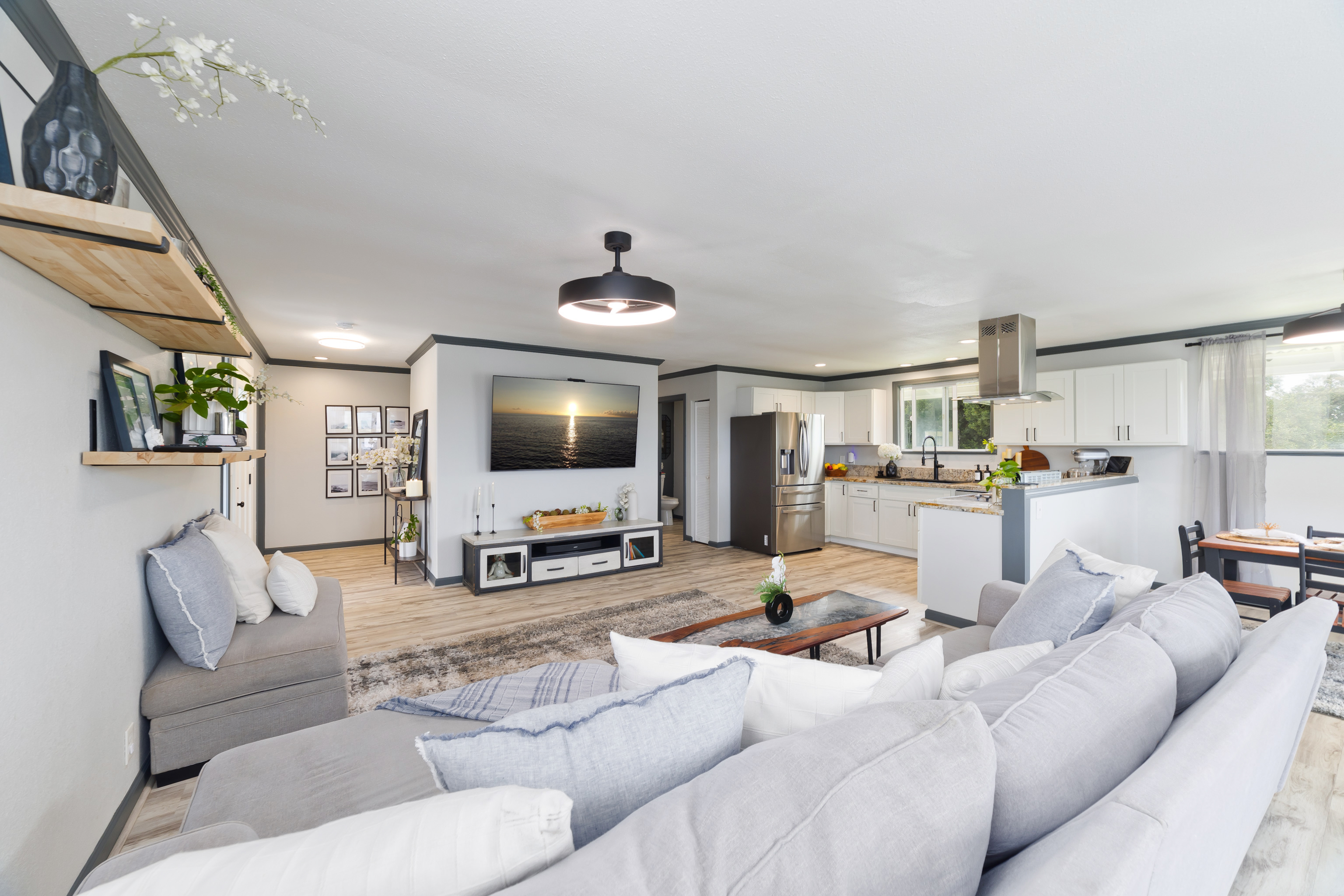 64-5246 Puu Nani Drive Kamuela, HI 96743 - Photo 1 of 25 a living room with furniture and a flat screen tv
