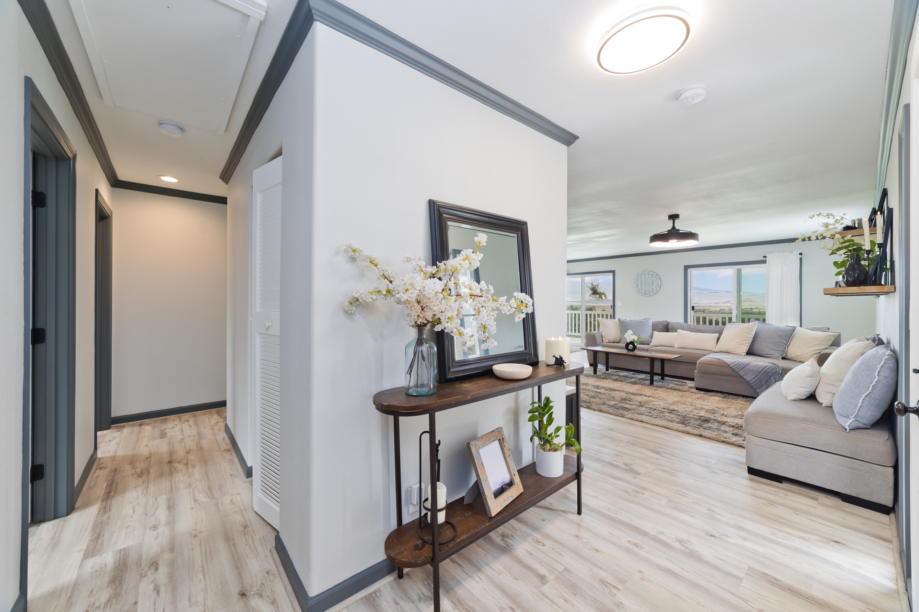 64-5246 Puu Nani Drive Kamuela, HI 96743 - Photo 16 of 25 a living room with furniture and wooden floor