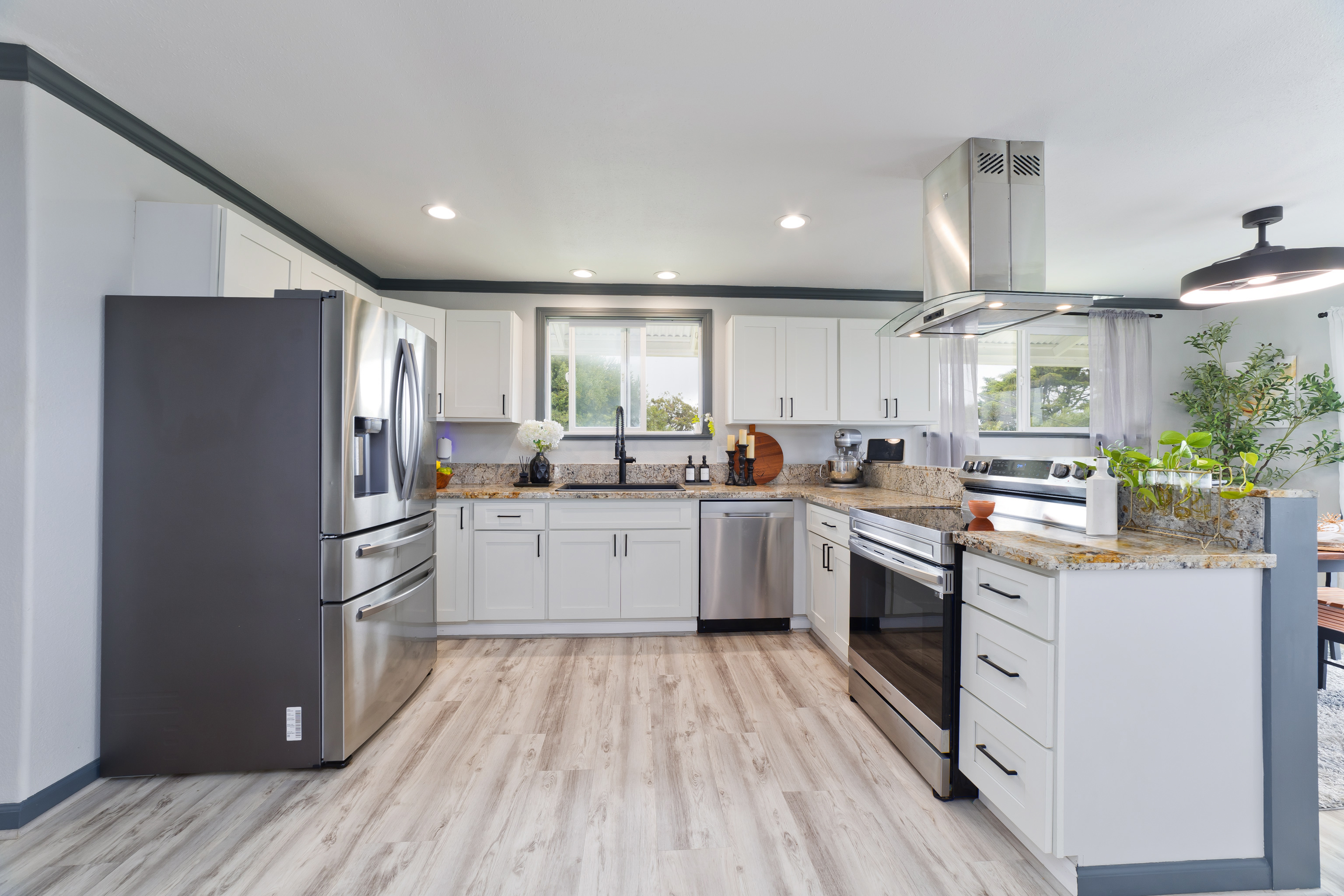 64-5246 Puu Nani Drive Kamuela, HI 96743 - Photo 4 of 25 a kitchen with refrigerator a sink and wooden floor