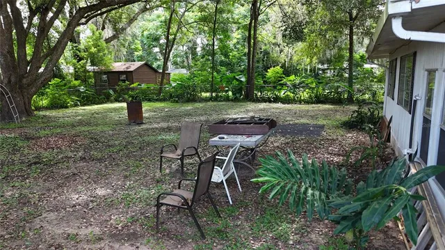 a view of outdoor space yard deck patio and outdoor seating
