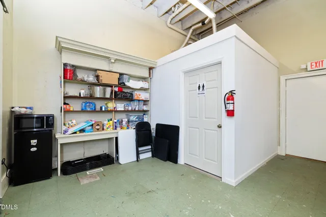 a view of entryway with wooden floor and stairs