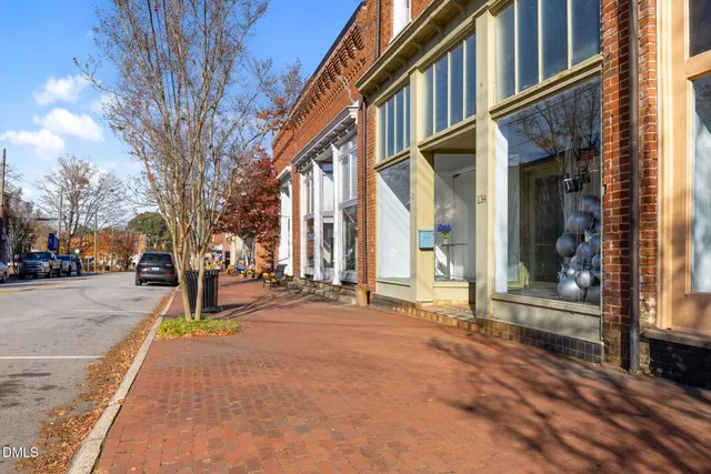 a view of a building with a street