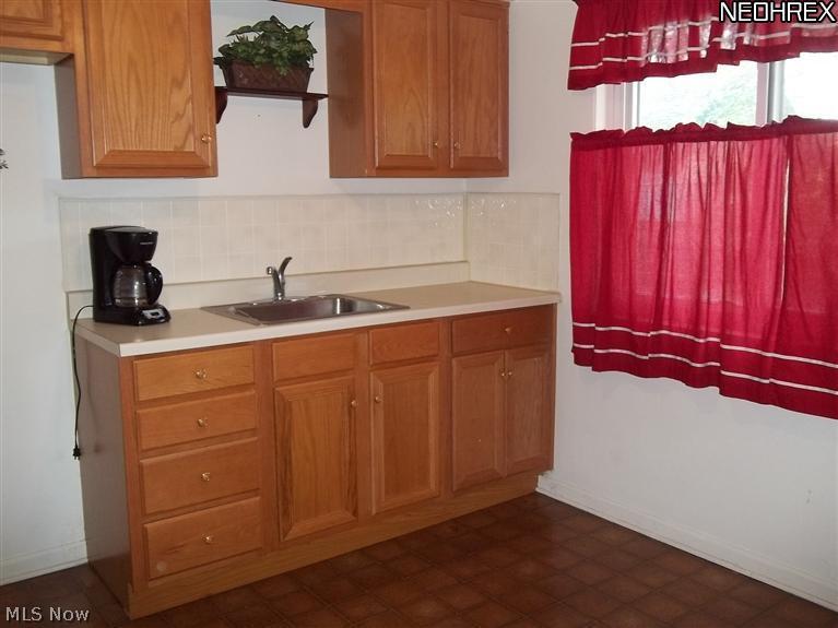 6418-6420 Ridge Road Parma, OH 44129 - Photo 7 of 16 Kitchen area with newer cabinets.